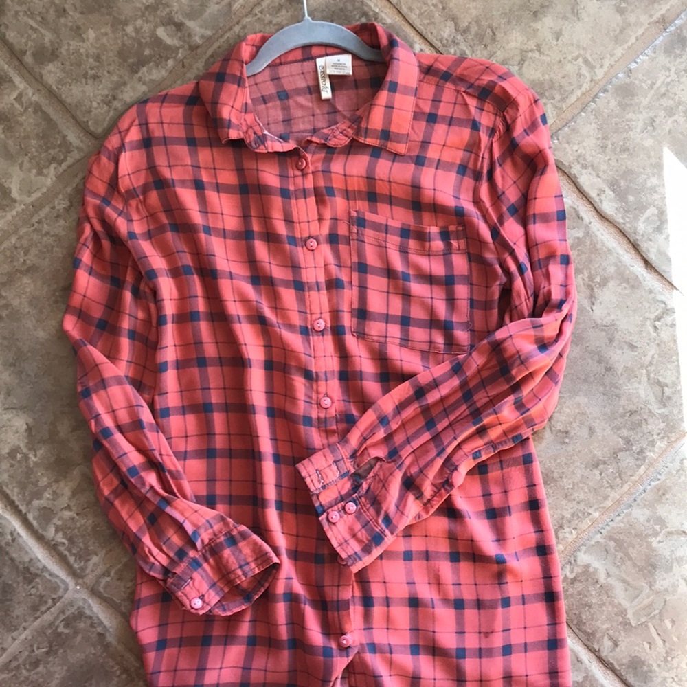 Long button up coral colored with navy stripes top.